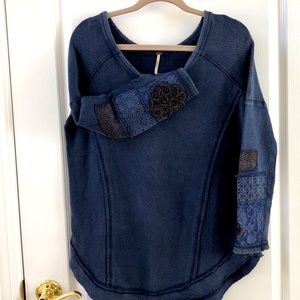 Free People top with decorative sleeves